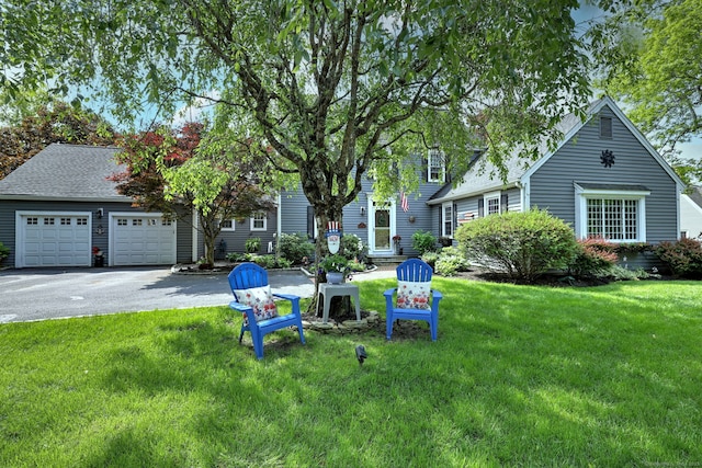 19 Old Colony Rd Unit 19, Monroe, CT 06468 - view of front facade with a front lawn, asphalt driveway, and a shingled roof