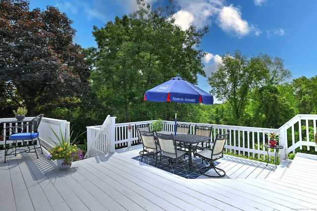 19 Old Colony Rd Unit 19, Monroe, CT 06468 - wooden deck with outdoor dining space and view of scattered trees