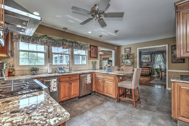19 Old Colony Rd Unit 19, Monroe, CT 06468 - kitchen featuring dishwasher, a peninsula, exhaust hood, healthy amount of natural light, and recessed lighting