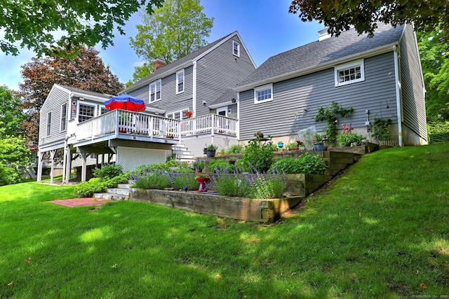 19 Old Colony Rd Unit 19, Monroe, CT 06468 - rear view of property with a deck, a lawn, a chimney, a vegetable garden, and a shingled roof