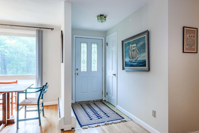 20 Wescott Rd, Simsbury, CT 06070 - entryway featuring light wood-style flooring and baseboards