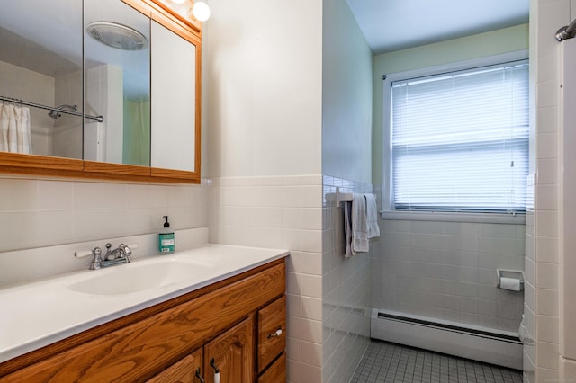20 Wescott Rd, Simsbury, CT 06070 - full bath featuring baseboard heating, vanity, tile walls, a shower with shower curtain, and tile patterned floors