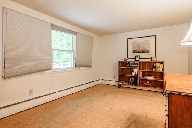 20 Wescott Rd, Simsbury, CT 06070 - unfurnished room with a baseboard heating unit and light carpet