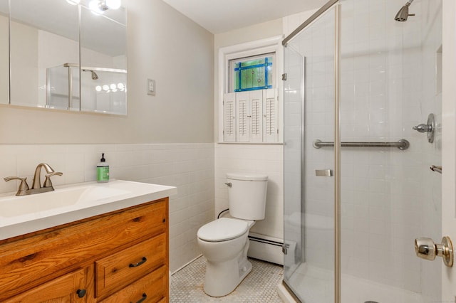 20 Wescott Rd, Simsbury, CT 06070 - full bathroom featuring a baseboard radiator, tile walls, a stall shower, toilet, and vanity