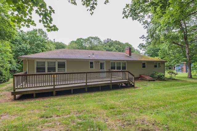 20 Wescott Rd, Simsbury, CT 06070 - back of house featuring a wooden deck, a lawn, and a chimney