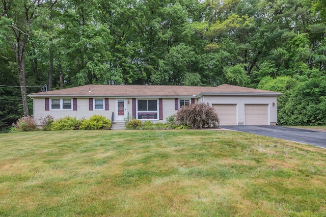 20 Wescott Rd, Simsbury, CT 06070 - ranch-style house with a garage, asphalt driveway, and a front yard