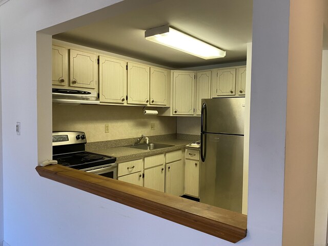 1700 Broadbridge Ave Unit A16, Stratford, CT 06614 - kitchen with stainless steel appliances, ventilation hood, and a sink