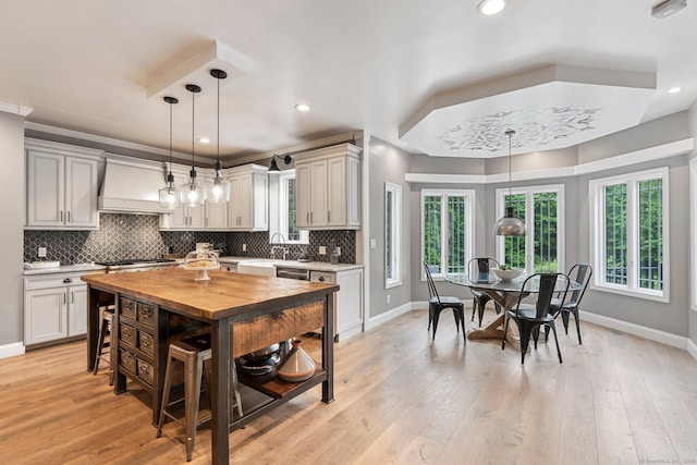 86 Charolais Way, Burlington, CT 06013 - kitchen with custom exhaust hood, baseboards, a sink, tasteful backsplash, and recessed lighting