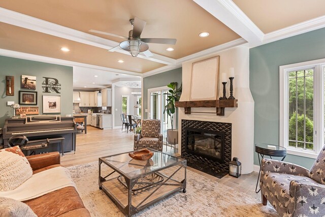 86 Charolais Way, Burlington, CT 06013 - living area with crown molding, light wood-type flooring, ceiling fan, a tile fireplace, and recessed lighting