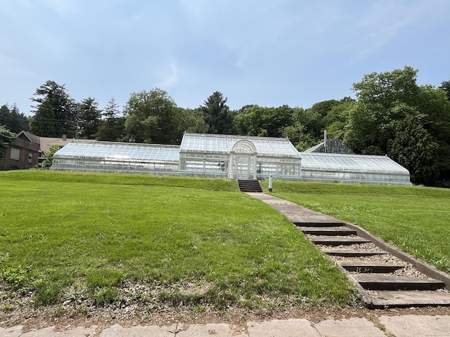 63 Park Rd, Hamden, CT 06517 - view of green lawn featuring an exterior structure and an outbuilding