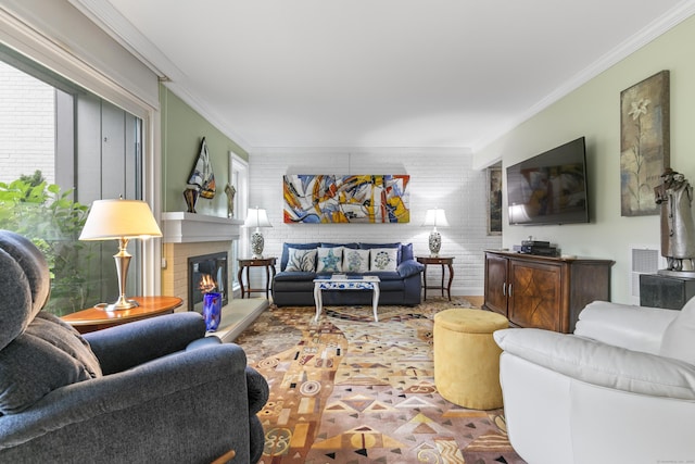 85 Viscount Dr Unit 15C, Milford, CT 06460 - living room with ornamental molding and a warm lit fireplace