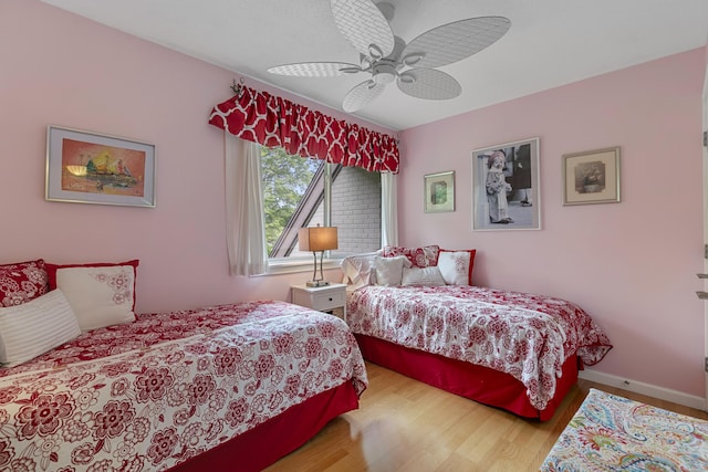 85 Viscount Dr Unit 15C, Milford, CT 06460 - bedroom with wood finished floors, ceiling fan, and baseboards