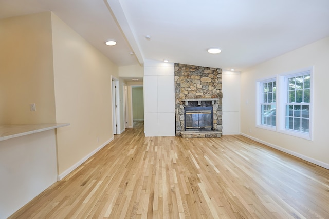 10 Crescent Park Rd, Westport, CT 06880 - unfurnished living room featuring light wood-style flooring and a fireplace