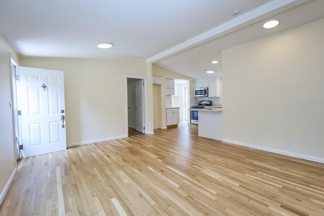 10 Crescent Park Rd, Westport, CT 06880 - unfurnished living room featuring light wood-type flooring and recessed lighting