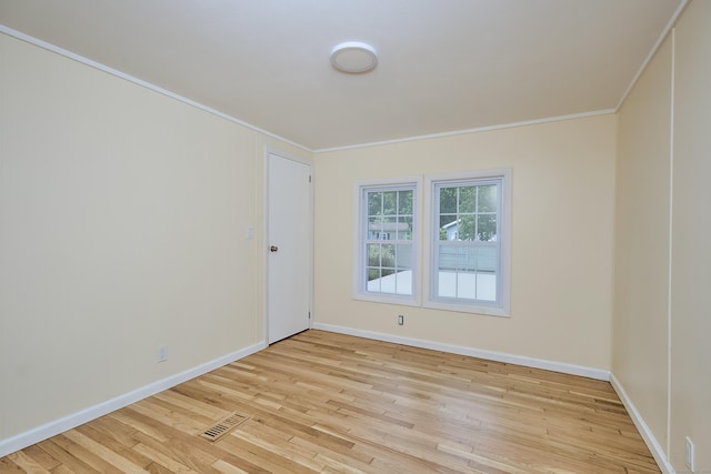 10 Crescent Park Rd, Westport, CT 06880 - spare room featuring ornamental molding and light wood-type flooring