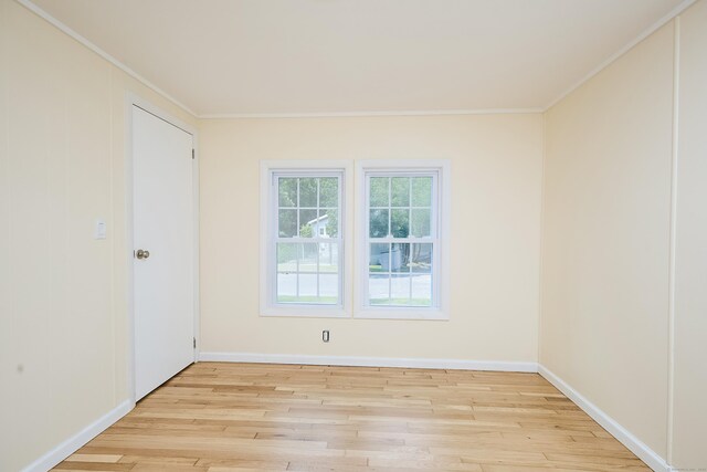 10 Crescent Park Rd, Westport, CT 06880 - empty room with wood finished floors and crown molding