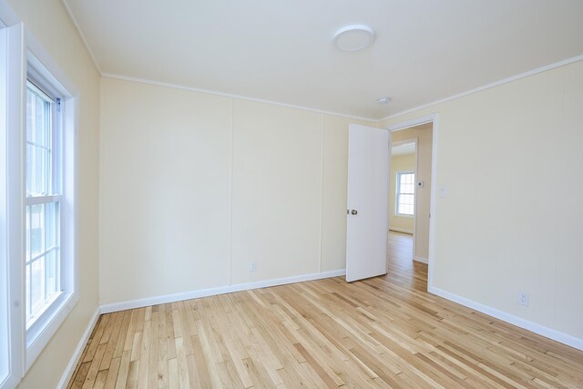 10 Crescent Park Rd, Westport, CT 06880 - unfurnished room featuring light wood-style floors and crown molding