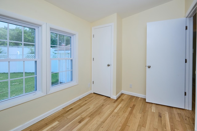 10 Crescent Park Rd, Westport, CT 06880 - unfurnished bedroom featuring light wood-style floors and baseboards
