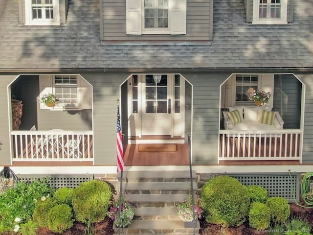 6 Prescott Ln, Greenwich, CT 06830 - entrance to property featuring roof with shingles