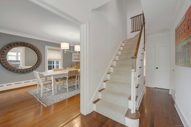 6 Prescott Ln, Greenwich, CT 06830 - staircase with wood finished floors, crown molding, and baseboards