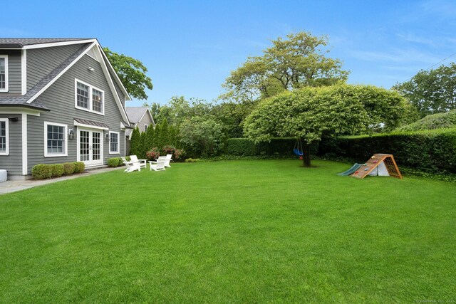 6 Prescott Ln, Greenwich, CT 06830 - view of green lawn with french doors