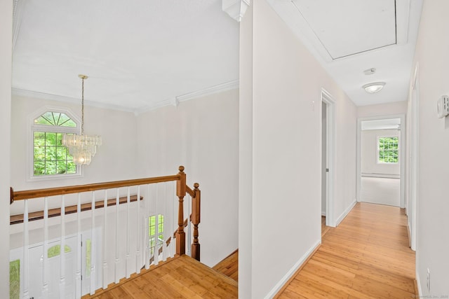 22 Loomis Dr, Coventry, CT 06238 - hallway featuring an upstairs landing, light wood-style floors, baseboards, a chandelier, and ornamental molding