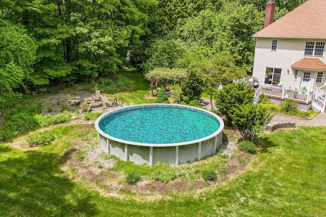 22 Loomis Dr, Coventry, CT 06238 - swimming pool featuring a wooden deck and a lawn
