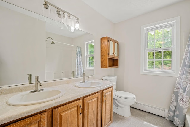 22 Loomis Dr, Coventry, CT 06238 - bathroom featuring a baseboard radiator, curtained shower, toilet, and double vanity