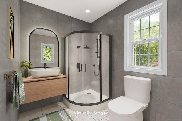 22 Loomis Dr, Coventry, CT 06238 - full bathroom featuring tile walls, a stall shower, vanity, toilet, and plenty of natural light