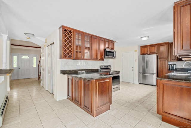 22 Loomis Dr, Coventry, CT 06238 - kitchen featuring stainless steel appliances, decorative backsplash, a peninsula, light tile patterned flooring, and glass insert cabinets