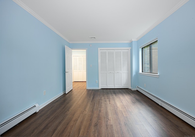 45 Ettl Ln Unit 301, Greenwich, CT 06831 - unfurnished bedroom featuring a baseboard heating unit, wood finished floors, crown molding, a closet, and baseboards