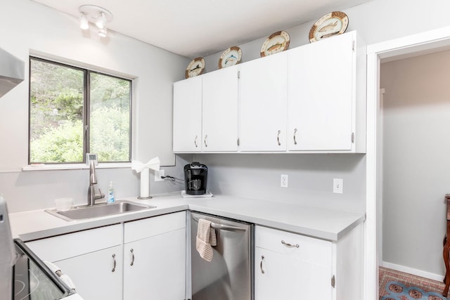 21 Heritage Vlg Unit B, Southbury, CT 06488 - kitchen featuring stainless steel dishwasher, light countertops, a sink, white cabinetry, and range