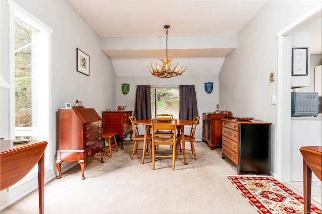 21 Heritage Vlg Unit B, Southbury, CT 06488 - dining room with a chandelier, light colored carpet, and lofted ceiling