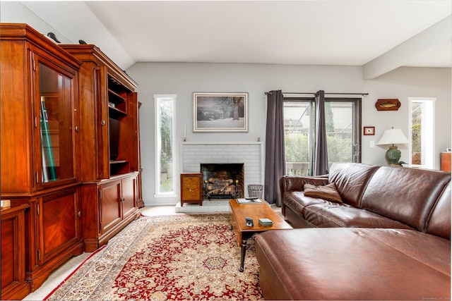 21 Heritage Vlg Unit B, Southbury, CT 06488 - living room featuring vaulted ceiling and a fireplace