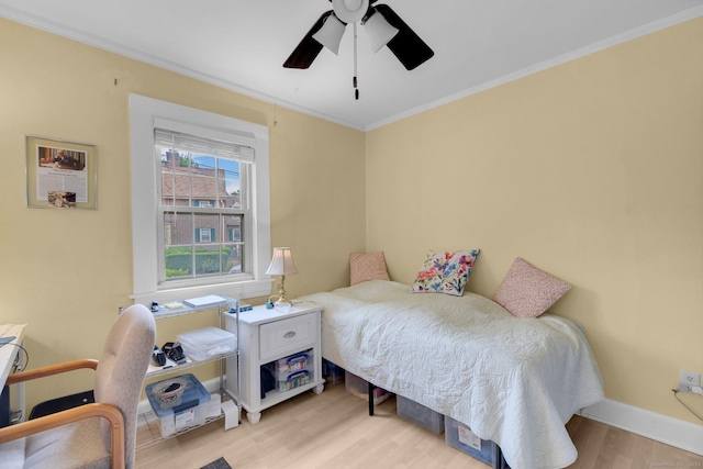 151 Alsace St, Bridgeport, CT 06604 - bedroom featuring light wood finished floors, crown molding, baseboards, and ceiling fan