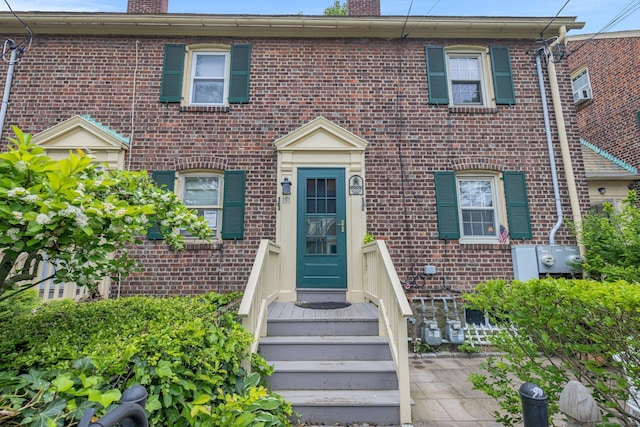 151 Alsace St, Bridgeport, CT 06604 - townhome / multi-family property featuring a chimney and brick siding