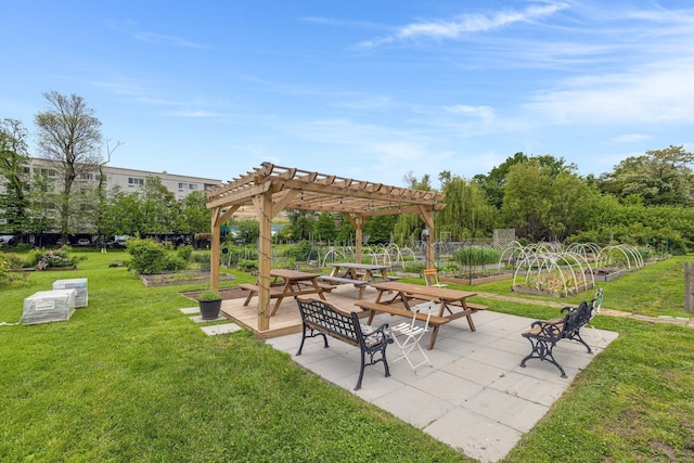 151 Alsace St, Bridgeport, CT 06604 - surrounding community with a pergola, a vegetable garden, and a patio area