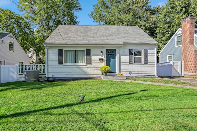 45 Coolidge Ave, Stamford, CT 06906 - view of front of house with central AC unit and a shingled roof