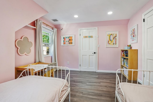 45 Coolidge Ave, Stamford, CT 06906 - bedroom featuring wood finished floors, recessed lighting, and baseboards