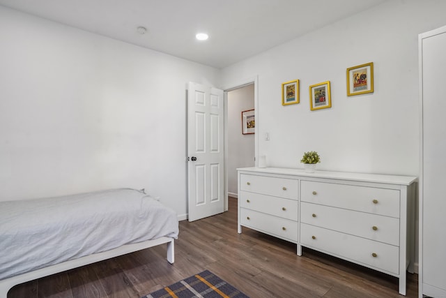 45 Coolidge Ave, Stamford, CT 06906 - bedroom with dark wood-style flooring, recessed lighting, and baseboards