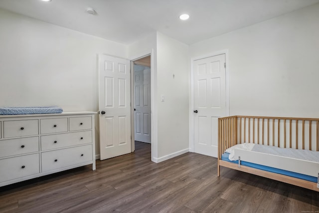 45 Coolidge Ave, Stamford, CT 06906 - bedroom featuring dark wood-type flooring, baseboards, and recessed lighting