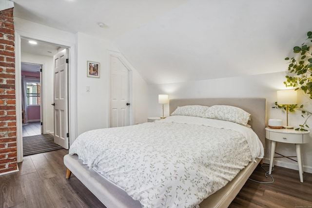 45 Coolidge Ave, Stamford, CT 06906 - bedroom featuring wood finished floors, baseboards, and lofted ceiling