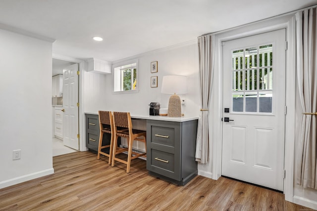45 Coolidge Ave, Stamford, CT 06906 - home office featuring light wood finished floors, crown molding, recessed lighting, and baseboards