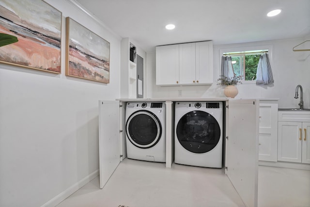 45 Coolidge Ave, Stamford, CT 06906 - washroom featuring washing machine and clothes dryer, cabinet space, and recessed lighting