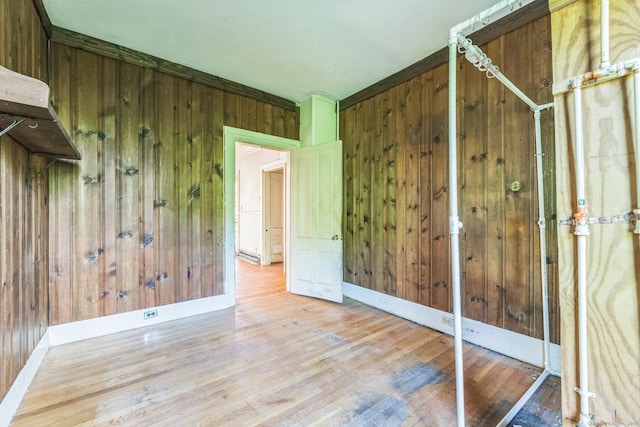 30 Mountain Ave, Winchester, CT 06098 - unfurnished room with wood finished floors, wooden walls, and baseboards