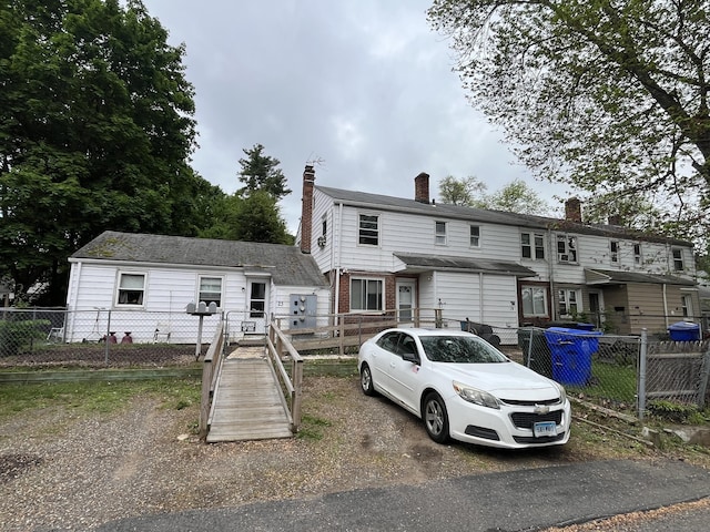 19 Outlook St, East Hartford, CT 06108 - view of front facade featuring a chimney