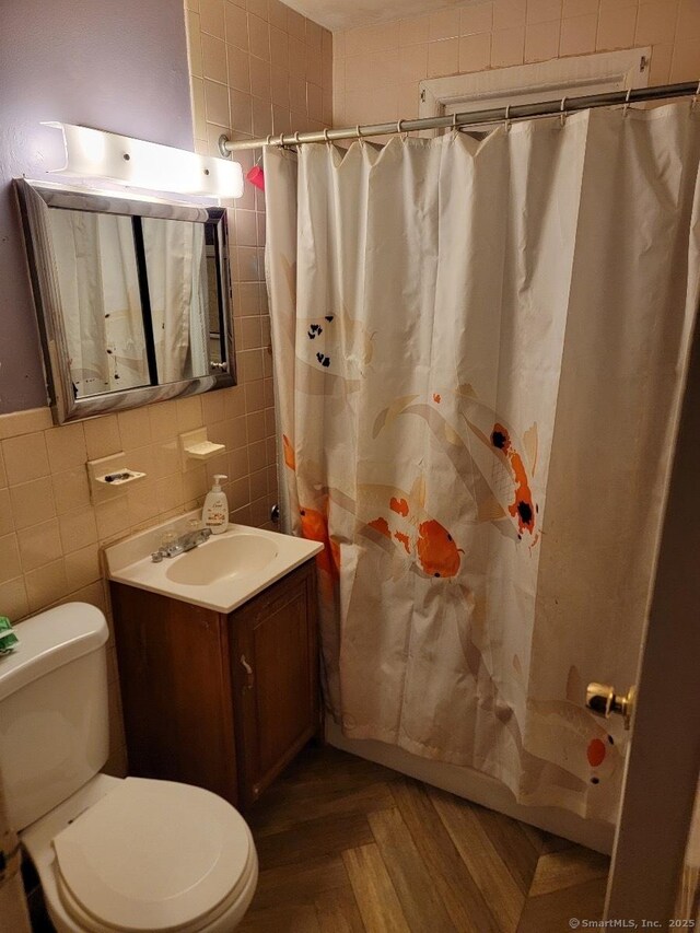 19 Outlook St, East Hartford, CT 06108 - full bath with tile walls, toilet, and vanity