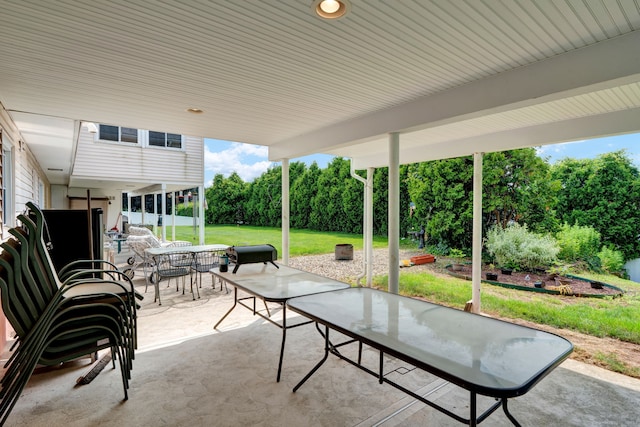 9 Marion Ct, North Haven, CT 06473 - view of patio / terrace with outdoor dining space and view of wooded area