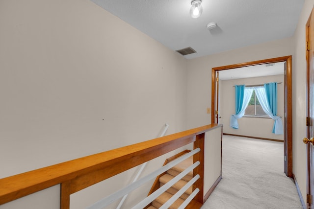 166 Old Brookfield Rd Unit 11C1, Danbury, CT 06811 - hall featuring light colored carpet and an upstairs landing