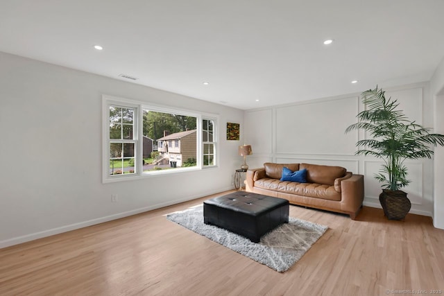 29 Magellan Dr, Milford, CT 06460 - living area with wood finished floors and recessed lighting